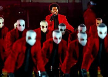 The Weeknd brings bright lights, bandaged dancers to Super Bowl