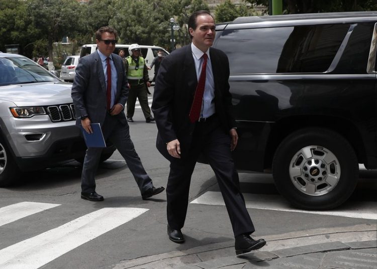 FILE - In this Jan. 15, 2020 file photo, Mauricio Claver-Carone, deputy assistant to President Donald Trump and senior director for Western Hemisphere affairs, right, arrives to meet with Bolivia's Foreign Minister Karen Longaric in La Paz, Bolivia. Claver-Carone was elected as the new president of the Inter-American Development Bank (IDB) in the fall of 2020. (AP Photo/Juan Karita, File)