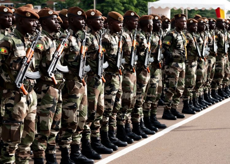 BAMAKO, MALI - SEPTEMBER 22: Malian army soldiers get ready ahead of the National Day military parade on September 22, 2018 in Bamako, Mali. (Photo by Xaume Olleros/Getty Images)