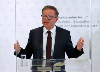 Austrian Health Minister Rudolf Anschober attends a news conference in Vienna, Austria, April 13, 2021.