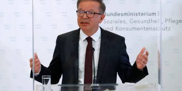 Austrian Health Minister Rudolf Anschober attends a news conference in Vienna, Austria, April 13, 2021.
