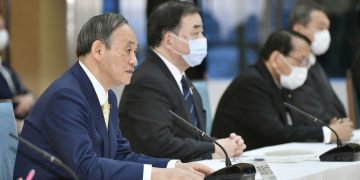 Japan to start releasing Fukushima water into sea in 2 years 1 - Egyptian Gazette Japanese Prime Minister Yoshihide Suga attends a cabinet meeting at his official residence in Tokyo Tuesday.