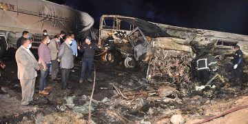 20 killed in truck-bus crash