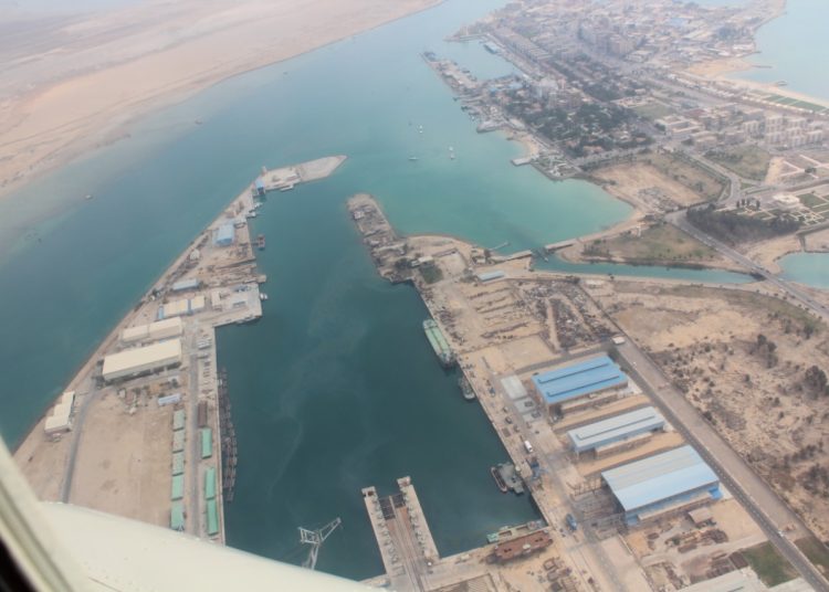 An aerial view of the Suez Canal area as seen by Minister Fouad during her tour Thursday  .