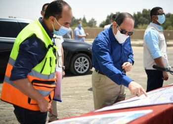 President Sisi checking the designs of development projects in eastern Cairo.