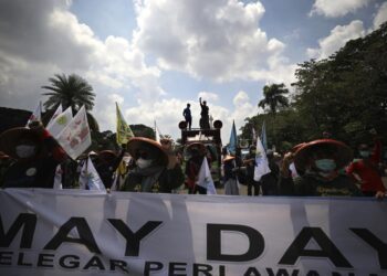 May Day protesters demand more job protections amid pandemic