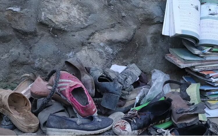 A pile of shoes, some stained with blood, recovered from the scene of the explosion