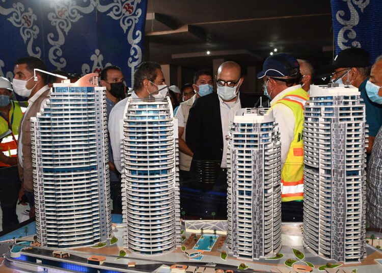 Housing minister lays foundation stone for Down Town towers in New Alamein 1 - Egyptian Gazette