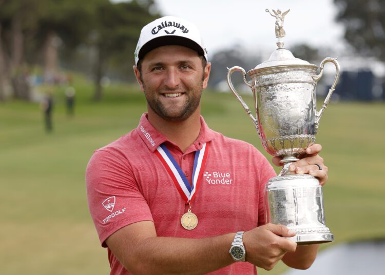 Rahm wins US Open to take 1st major crown 1 - Egyptian Gazette Jon Rahm celebrates with the trophy after winning the US Open golf tournament in San Diego.