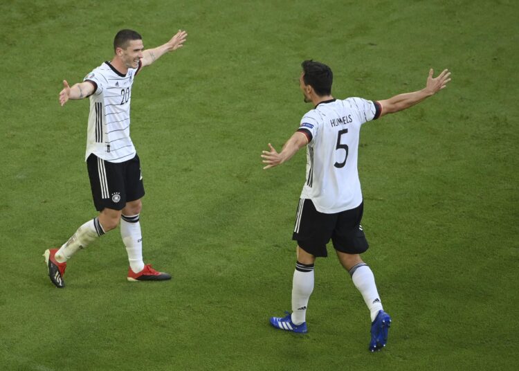 Germany's Robin Gosens (L) celebrates with Mats Hummels after scoring his side's fourth goal during the Euro 2020 championship group F match against Portugal in Munich.
