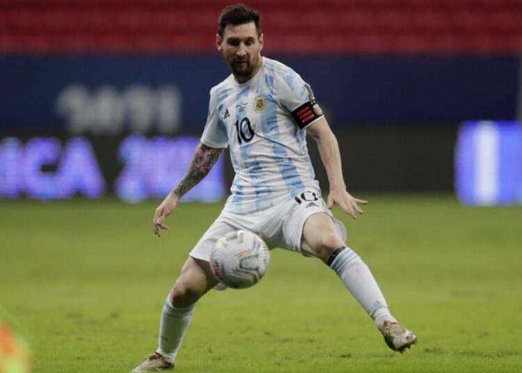 Argentina, Chile through to Copa America quarter-final 1 - Egyptian Gazette Argentina's Lionel Messi in action against Paraguay at Estadio Mane Garrincha, Brasilia.