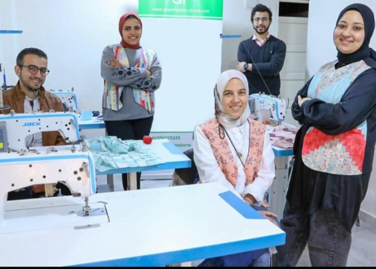 Furnishing new home always fashion from recycled textles 1 - Egyptian Gazette Hadeer Shalaby(R), founder of Green Fashion together with her team.