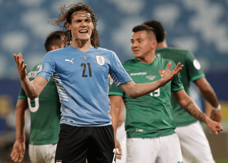 Edinson Cavani scored his 52nd goal for Uruguay  in a 2-0 Copa America victory over Bolivia.