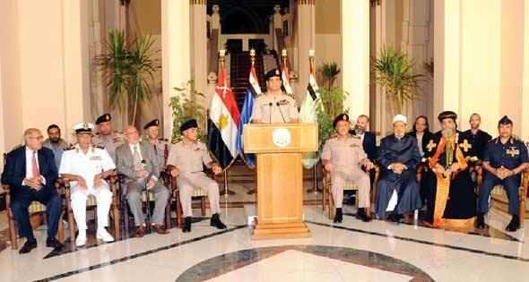 July 3: Day to live in Egyptians’ collective memory 1 - Egyptian Gazette Then-minister of defence, now President, Abdel Fattah El Sisi (middle) in his military uniform reading out the decisions of the nation's political forces on July 3, 2013.