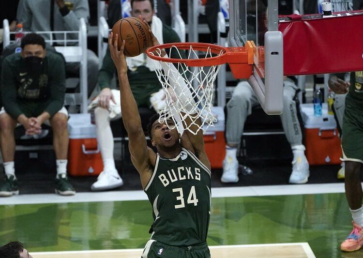 Milwaukee Bucks Giannis Antetokounmpo dunks against the Phoenix Suns during their Game 3 of NBA Finals in Milwaukee.
