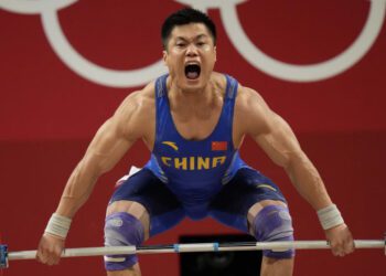 Olympics-Weightlifting: Xiaojun becomes oldest Olympic champ at 37