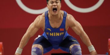 Olympics-Weightlifting: Xiaojun becomes oldest Olympic champ at 37