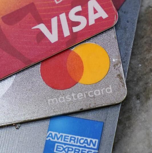 American Express, Visa and Master card cards on display in Richmond, Va., Thursday, July 1, 2021. U.S. consumer borrowing surged by $35.3 billion in May as Americans, bolstered by a reopening economy and rising job levels, went back to using credit in a big way. Borrowing on credit cards and for auto and student loans showed solid gains in May, the Federal Reserve reported Thursday, July 8, 2021.