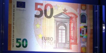 Euro slips after ECB pledges low rates for even longer