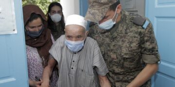 Tunisia puts military on vaccination duty as cases soar