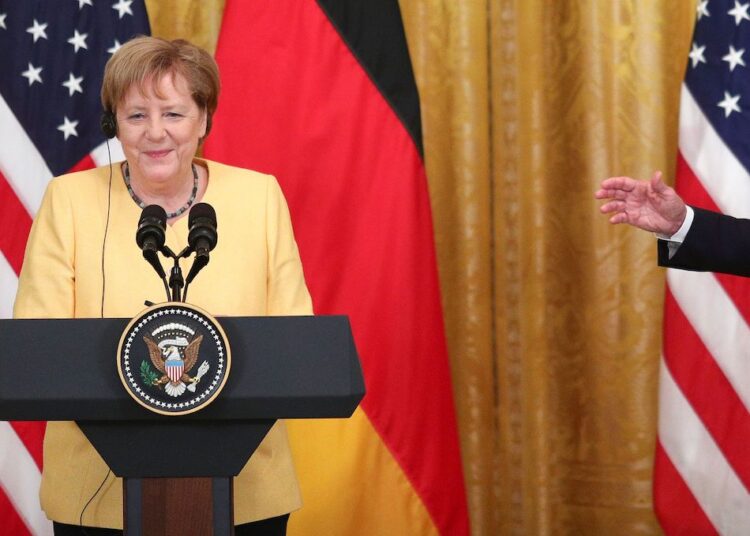 U.S. President Joe Biden and German Chancellor Angela Merkel attend a joint news conference in the East Room at the White House in Washington, US.