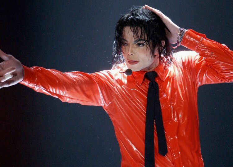 A file photo shows Michael Jackson performs "Dangerous" during the taping of the American Bandstand's 50th anniversary show on April 20, 2002, in Pasadena, California.