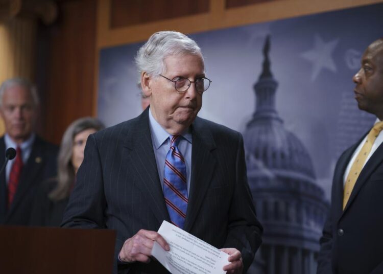 Senate Minority Leader Mitch McConnell, R-Ky., and other GOP senators speak to reporters ahead of a test vote scheduled by Democratic Leader Chuck Schumer of New York on the bipartisan infrastructure deal senators brokered with President Joe Biden, in Washington, on Wednesday.