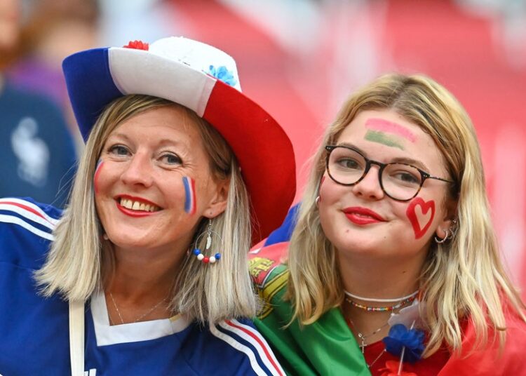 France and Portugal fans cheer in the stand prior to the start of the Euro 2020 group F match between Portugal and France at the Puskas Arena.