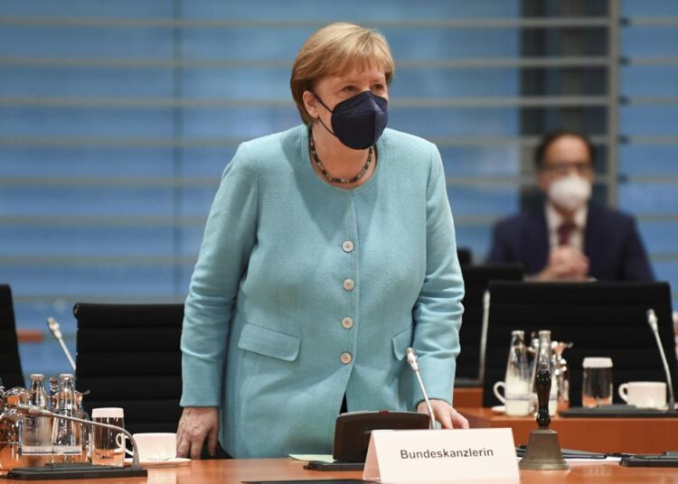 German Chancellor Angela Merkel attends the weekly cabinet meeting at the Chancellery in Berlin, Germany, yesterday.