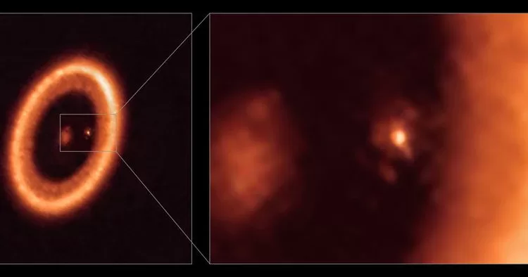An undated image, taken with the Atacama Large Millimeter/submillimeter Array (ALMA), in which the European Southern Observatory is a partner, shows wide (left) and close-up (right) views of the moon-forming disc surrounding PDS 70c, a young Jupiter-like planet nearly 400 light-years away. The close-up view shows PDS 70c and its circumplanetary disc center-front, with the larger circumstellar ring-like disc taking up most of the right-hand side of the image. The star PDS 70 is at the center of the wide-view image on the left.