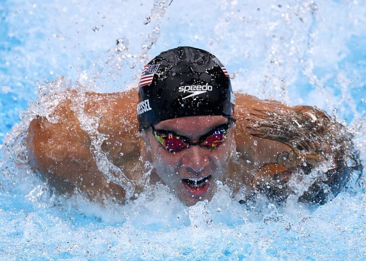 Caeleb Dressel stormed to the men's 100m butterfly title with a world record time of 49.45 to pick up his second individual gold of the Tokyo Games.