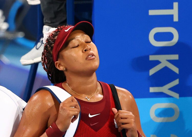Olympics-Tennis: Naomi Osaka exits Games 1 - Egyptian Gazette Naomi Osaka of Japan walks off after losing her third round match against Marketa Vondrousova of Czech Republic on Tuesday July 27, 2021.