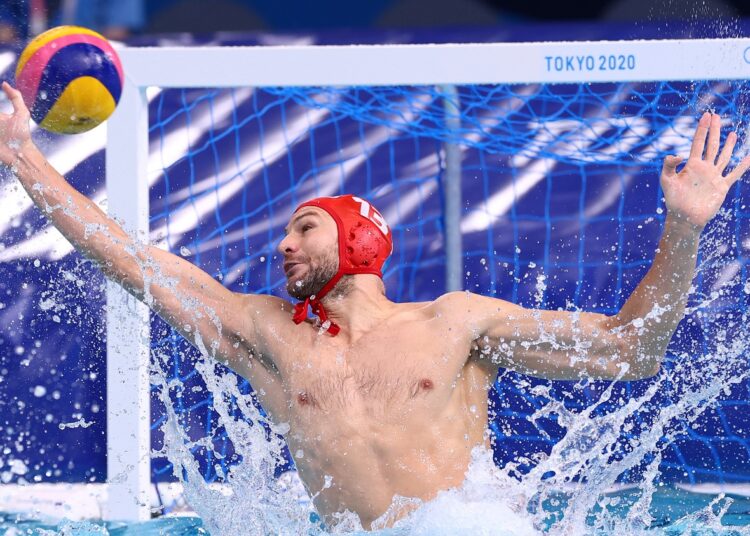 Branislav Mitrovic of Serbia in action in the Water polo competitions at the Tokyo Olympics.