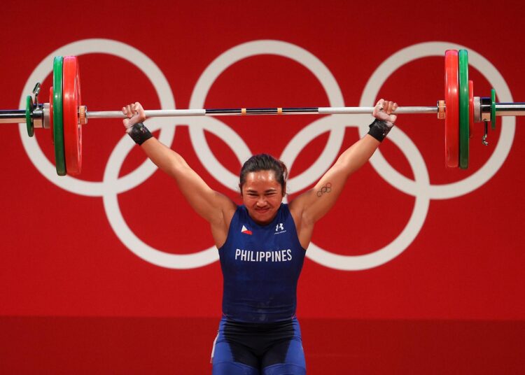 Philippines' Hidilyn Diaz competes in the women's 55kg weightlifting competition during the Tokyo Olympic Games.
