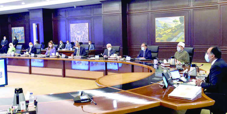 Prime Minister Moustafa Madbouli presiding over the cabinet meeting held at the new government headquarters at New Alamein City on Thursday.