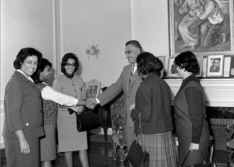 Milestones in women’s empowerment 1 - Egyptian Gazette Hikmat Abu Zeid (L) posing for a photo with president Gamal Abdel Nasser in the 1960s.