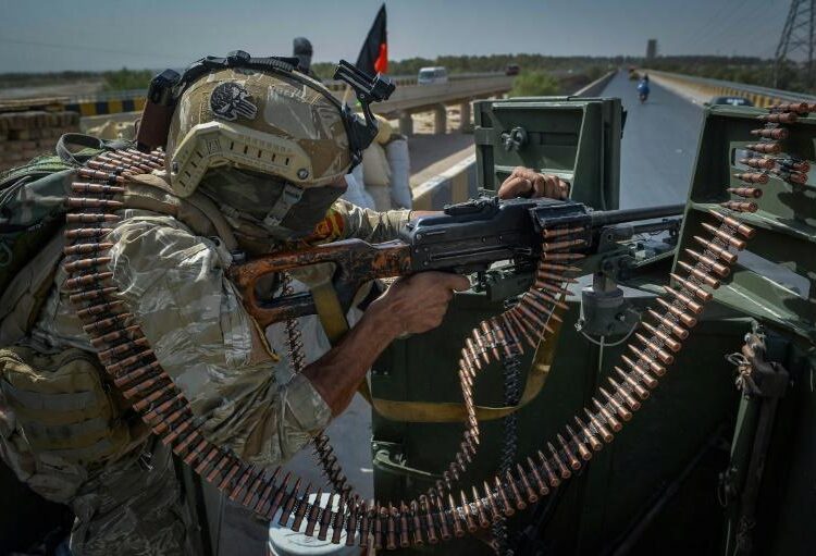 Taliban, Afghan forces clash again 1 - Egyptian Gazette An Afghan soldier keeping guard outside the United Nations Assistance Mission in Afghanistan compound in Herat a day after the mission was attacked.