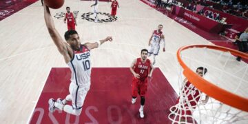 US bounces back from  Olympic-opening loss, routs  Iran 120-66