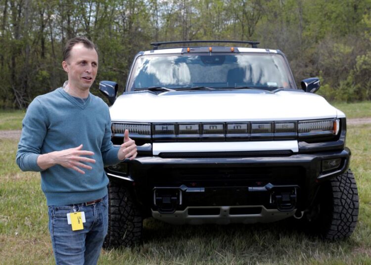 Josh Tavel, executive engineer for GMC Hummer EV, talks about a pre-production version of the Hummer electric pickup in Milford, Michigan, U.S., May 14, 2021.