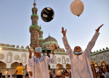 Muslims mark Eid al-Adha holiday in pandemic’s shadow