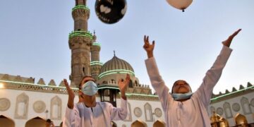 Muslims mark Eid al-Adha holiday in pandemic’s shadow