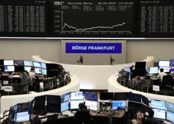 European stocks climb at end of volatile week
