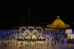 Tradition, fireworks and a moment of silence as Tokyo Games start 2 - Egyptian Gazette