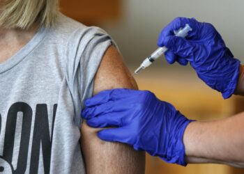 Rare ‘breakthrough’ COVID cases are causing confusion