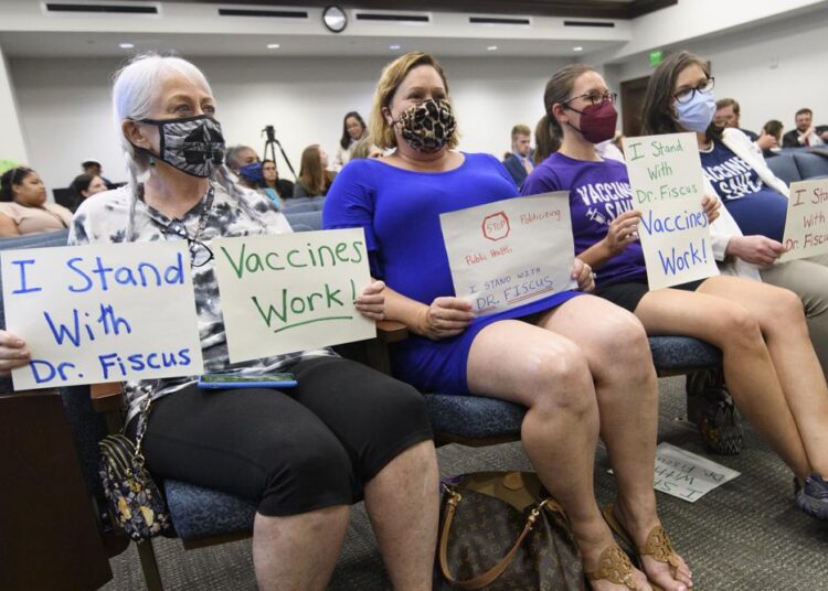Parental OK needed for minors to get COVID shot 1 - Egyptian Gazette Vaccine advocates wait for the start of a state legislative committee meeting, on July 21, 2021, in Nashville, Tenn.
