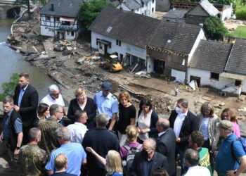 Merkel tours ‘surreal’ flood scene, vows aid, climate action