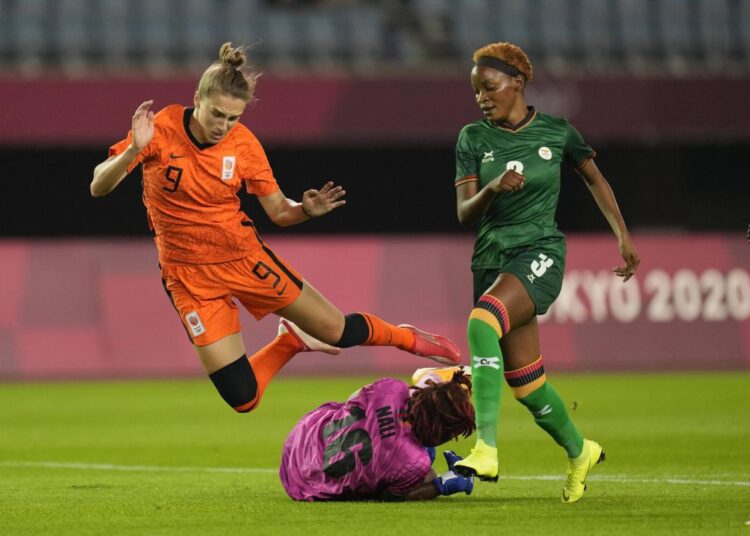 Netherlands' Vivianne Miedema collides with Zambia's goalkeeper Hazel Nali during a women's soccer match at the 2020 Summer Olympics, Wednesday, July 21, 2021, in Rifu, Japan.