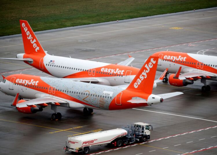 EasyJet airplanes are parked on the tarmac during the official opening of the new Berlin-Brandenburg Airport (BER) "Willy Brandt", in Schoenefeld near Berlin, Germany October 31, 2020.