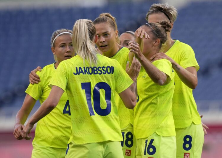 Sweden's players gather during a women's soccer match against Australia at the 2020 Summer Olympics, Saturday, July 24, 2021, in Saitama, Japan.