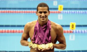 Tunisian Mellouli changes his mind and will swim in Tokyo 4 - Egyptian Gazette